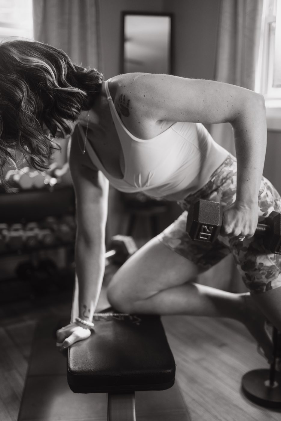 Heather doing a one arm dumbbell row